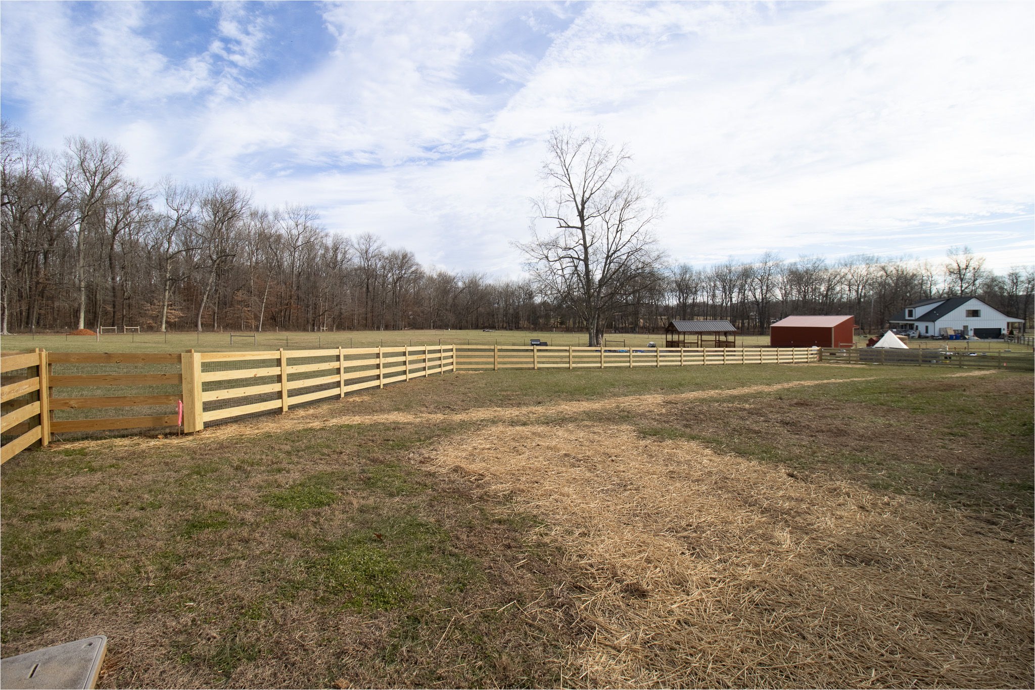 264 Dink Rut Road Portland, TN 37148 - Photo 53 of 56 a view of a field with an trees in the background