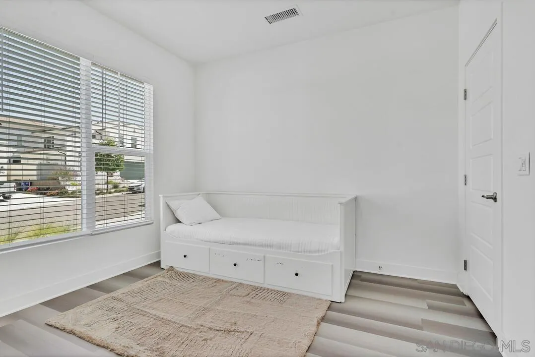 9041 West Bluff Place Santee, CA 92071 - Photo 11 of 42 a view of room with window and entryway