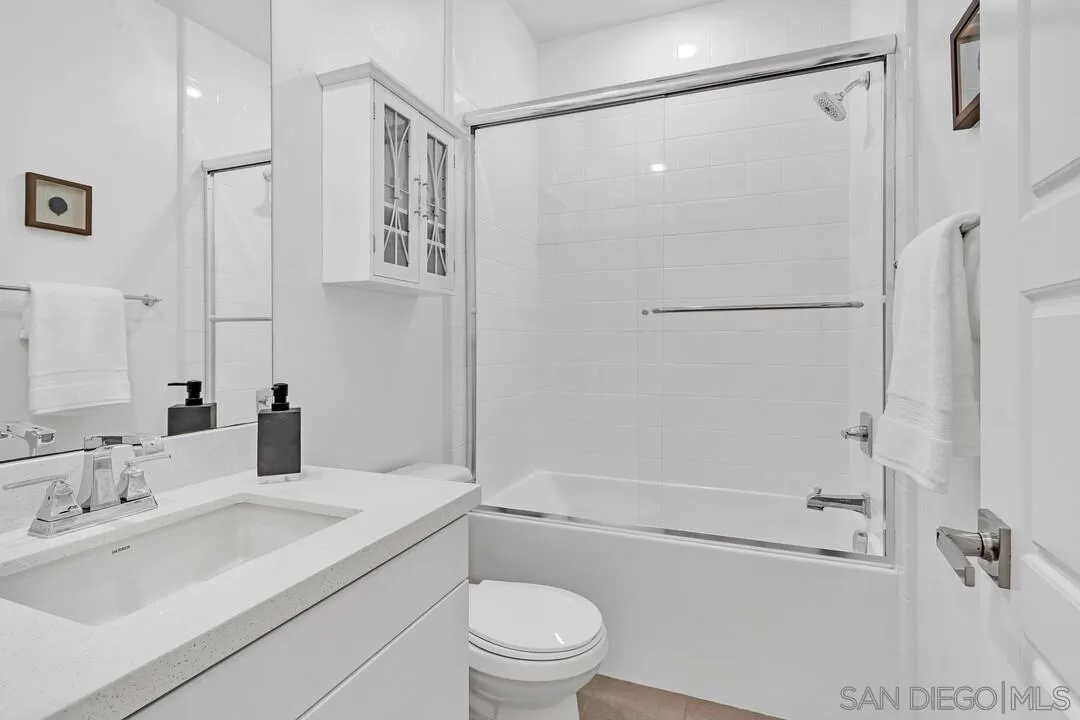 9041 West Bluff Place Santee, CA 92071 - Photo 12 of 42 a bathroom with a sink toilet and shower