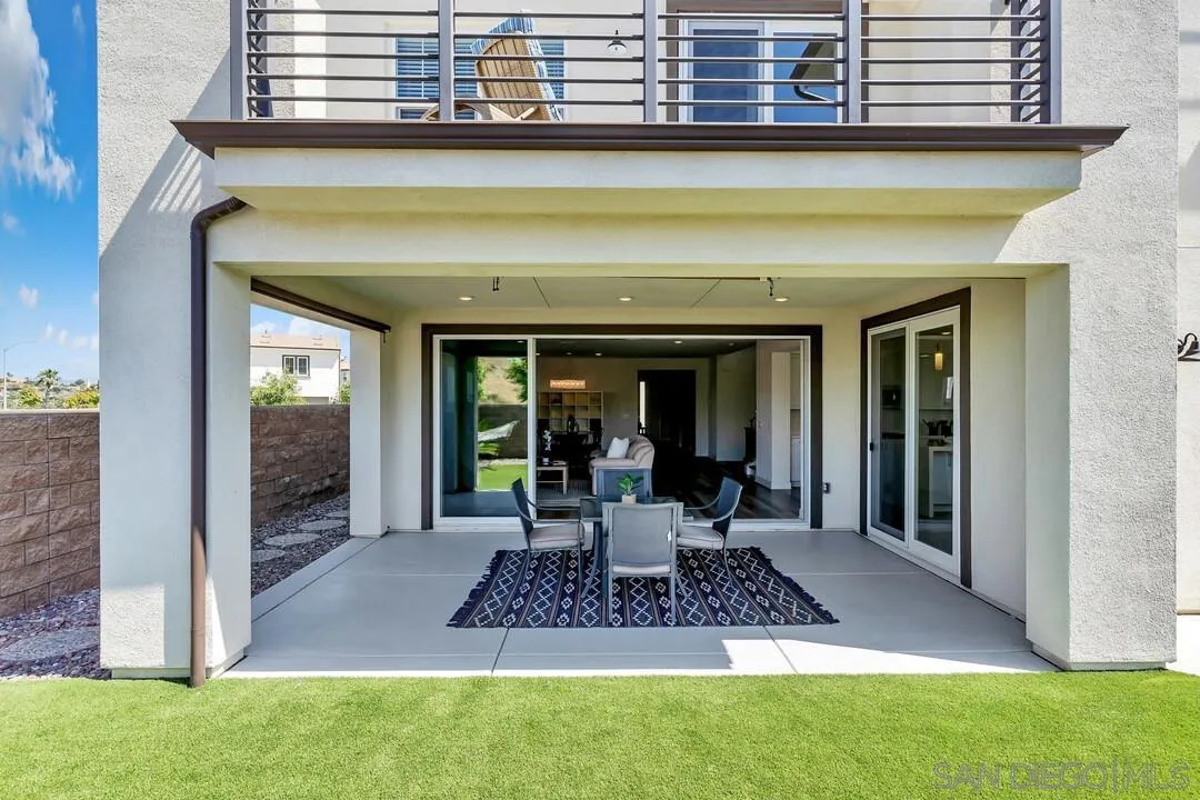 9041 West Bluff Place Santee, CA 92071 - Photo 28 of 42 a front view of a house with garden
