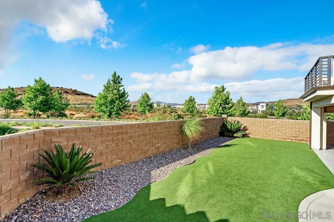 9041 West Bluff Place Santee, CA 92071 - Photo 29 of 42 a view of an outdoor space and a yard