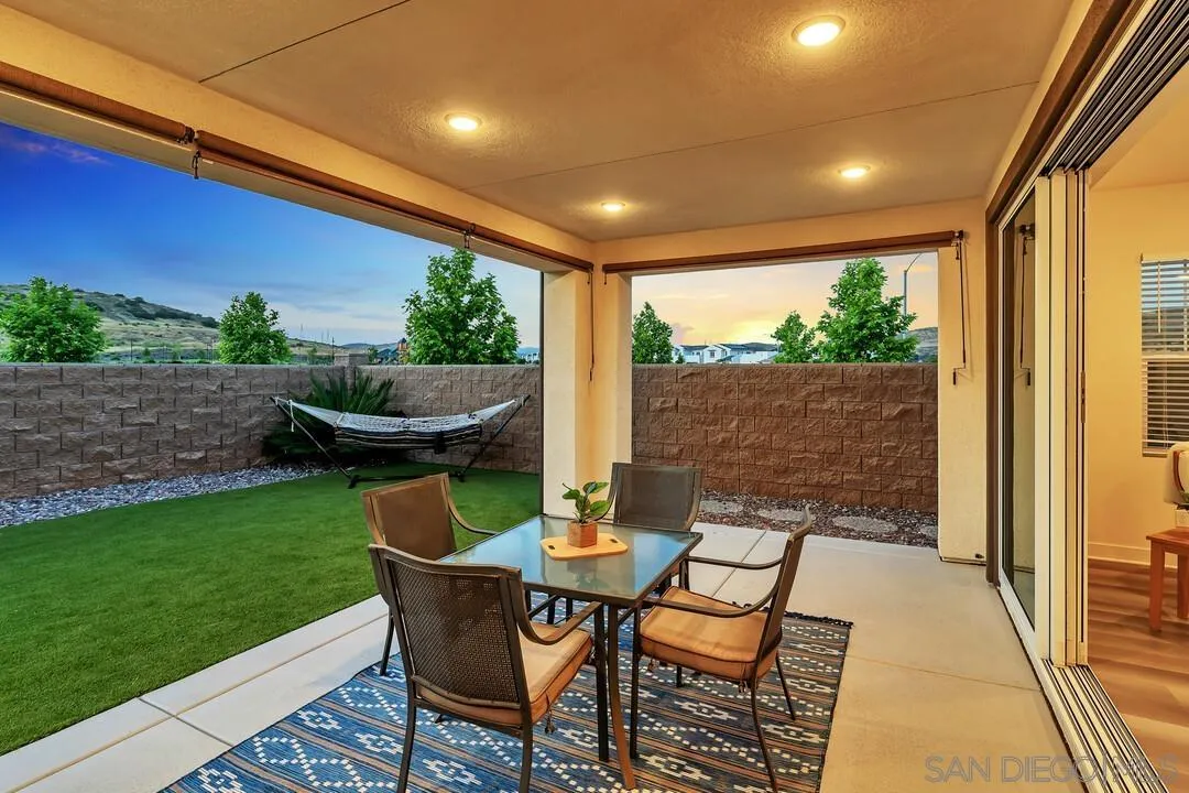 9041 West Bluff Place Santee, CA 92071 - Photo 32 of 42 a patio with table and chairs