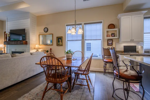 a view of a livingroom with furniture and a flat screen tv