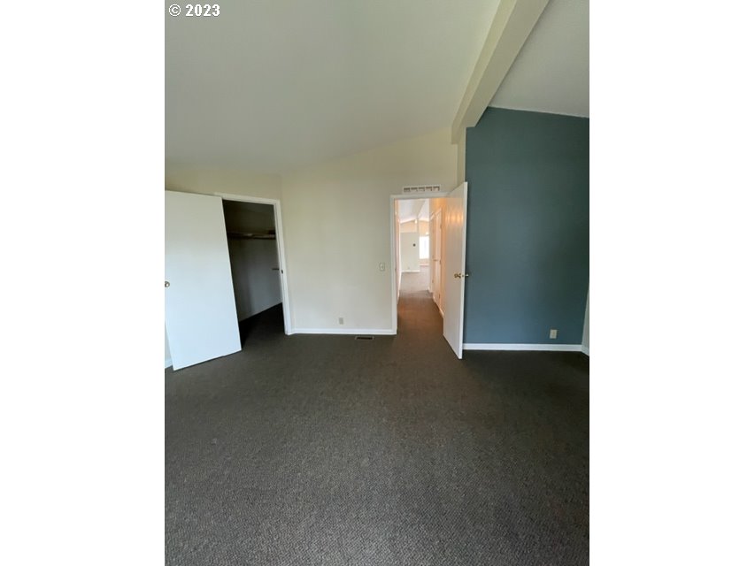 3355 North Delta Road Eugene, OR 97408 - Photo 11 of 15 a view of an empty room with a window
