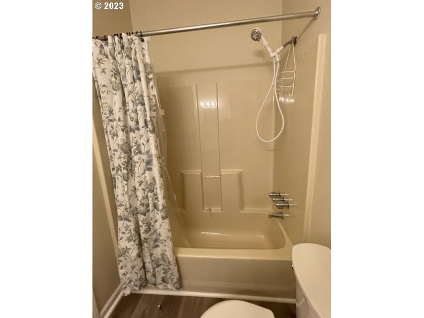 3355 North Delta Road Eugene, OR 97408 - Photo 14 of 15 a bathroom with a shower curtain and a shower curtain