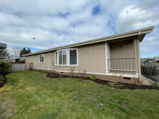 3355 North Delta Road Eugene, OR 97408 - Photo 2 of 15 a front view of a house with garden