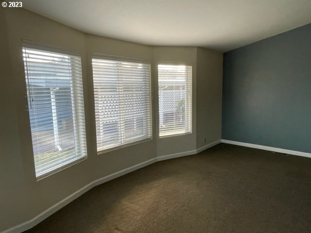 3355 North Delta Road Eugene, OR 97408 - Photo 6 of 15 an empty room with a window