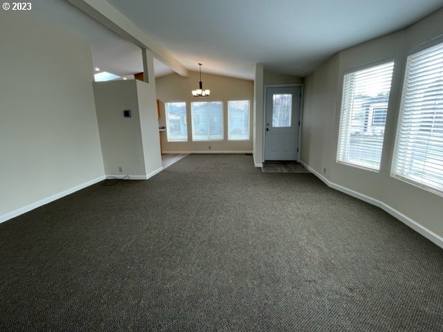 3355 North Delta Road Eugene, OR 97408 - Photo 7 of 15 an empty room with windows and cabinet