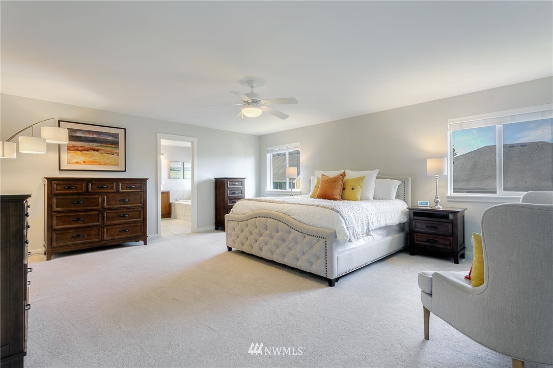 3922 216th Place Southeast Bothell, WA 98021 - Photo 17 of 33 a bedroom with a bed and dresser