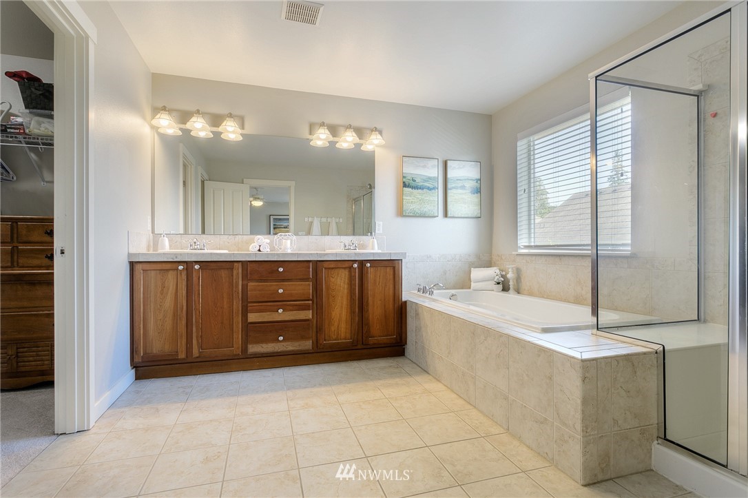 3922 216th Place Southeast Bothell, WA 98021 - Photo 21 of 33 a large bathroom with a large tub shower and sink