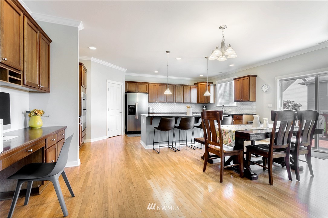 3922 216th Place Southeast Bothell, WA 98021 - Photo 5 of 33 a view of a dining room with furniture and wooden floor