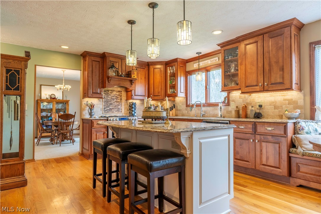 585 Yager Road Clinton, OH 44216 - Photo 15 of 35 Kitchen featuring a breakfast bar area
