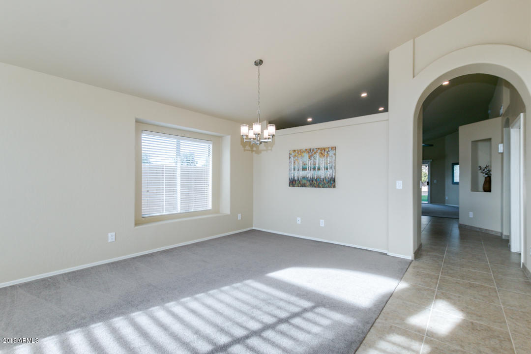 7292 South Roberts Road Tempe, AZ 85283 - Photo 2 of 38 a view of livingroom with window