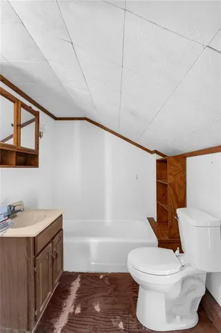 a view of a room with wooden walls