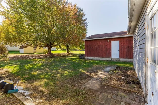 a view of a field with an ocean