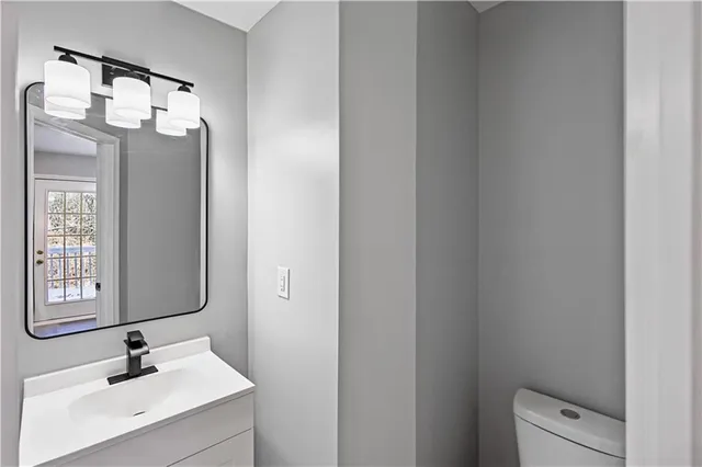 a view of a kitchen from the hallway