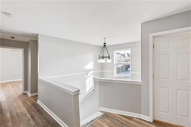 a bathroom with a shower and a mirror