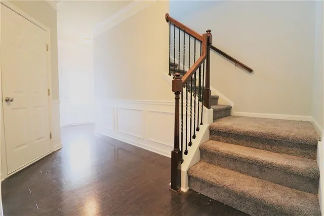 a view of entryway with wooden floor