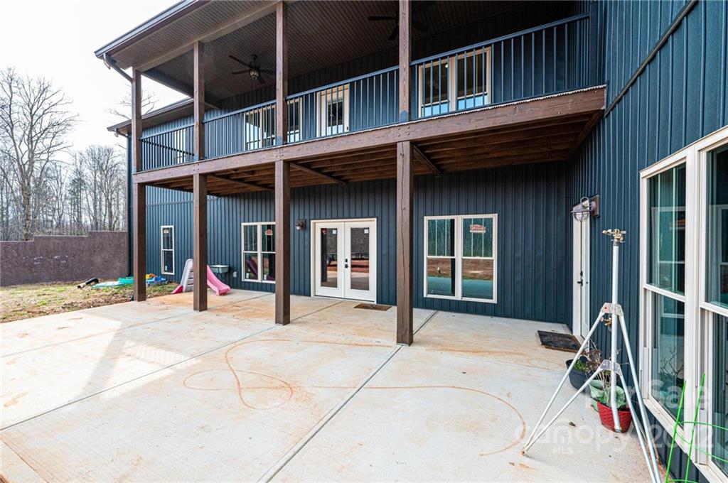 1289 Hopewell Church Road Hiddenite, NC 28636 - Photo 11 of 48 a house view with a outdoor space