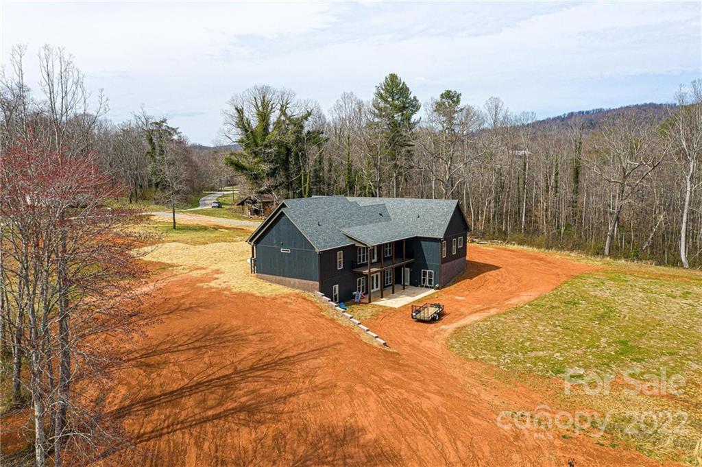 1289 Hopewell Church Road Hiddenite, NC 28636 - Photo 6 of 48 a view of a house with a yard