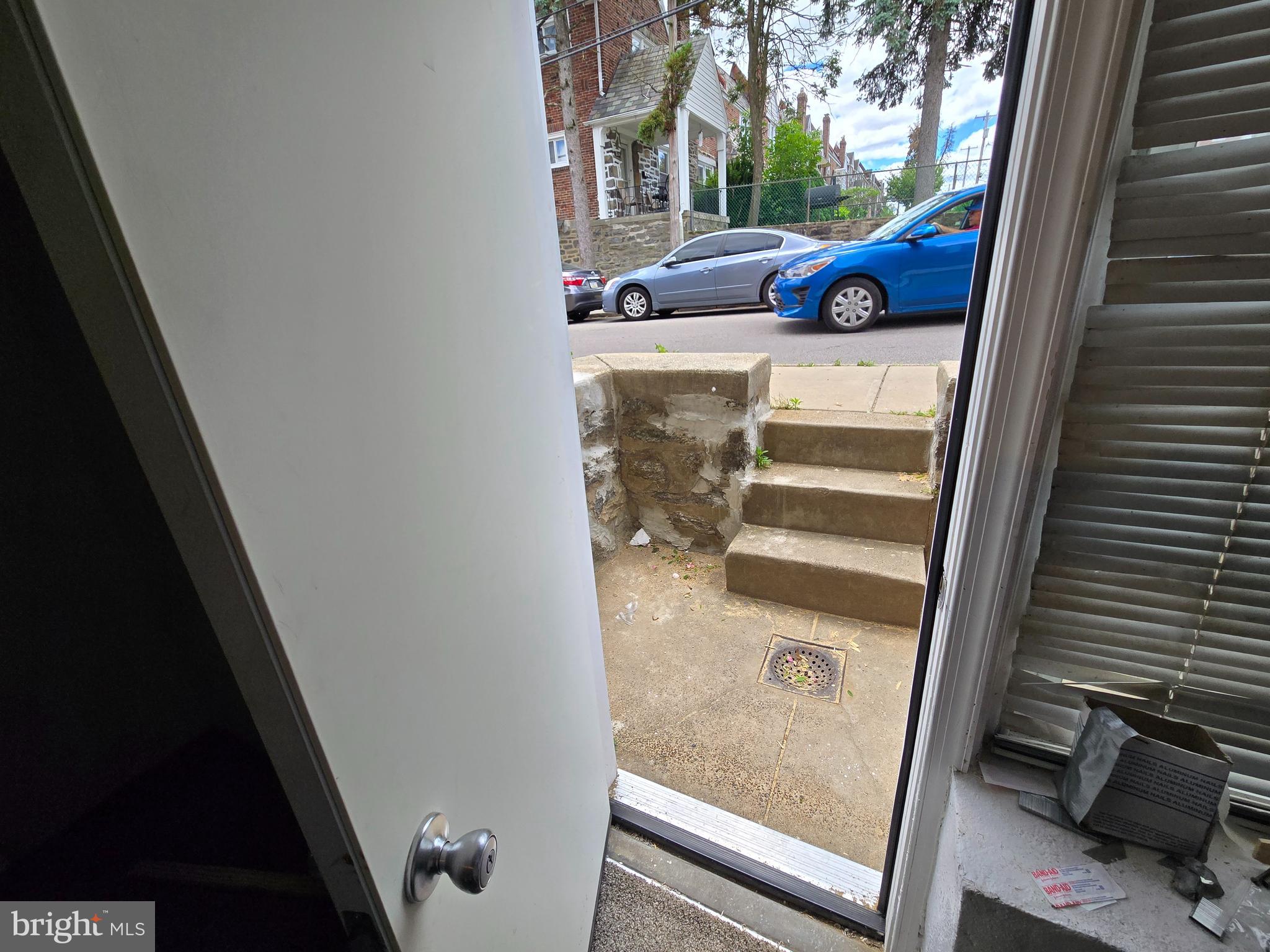 201 St Laurence Road Upper Darby, PA 19082 - Photo 20 of 37 a car parked in front of a door