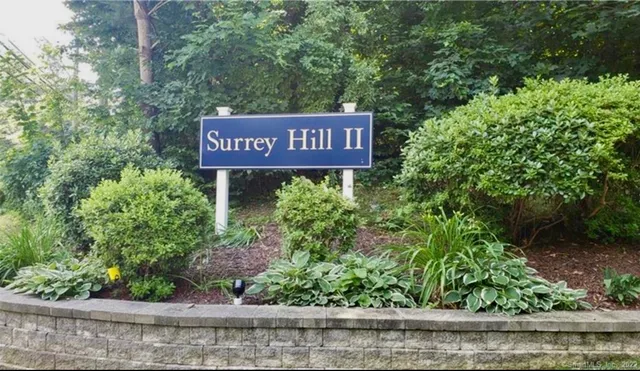 a sign on the side of a street