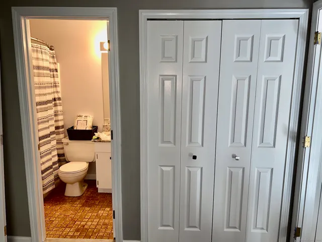 a bathroom with a toilet