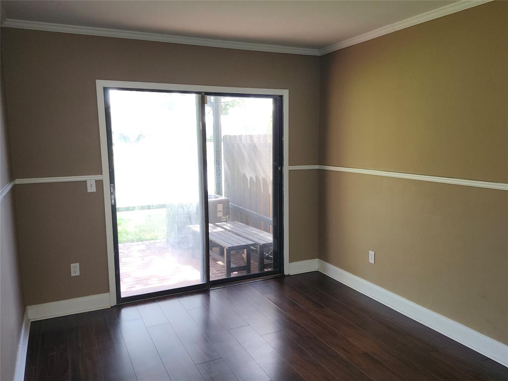 4192 Southwest 87th Terrace Davie, FL 33328 - Photo 15 of 35 a view of an empty room with wooden floor and a window