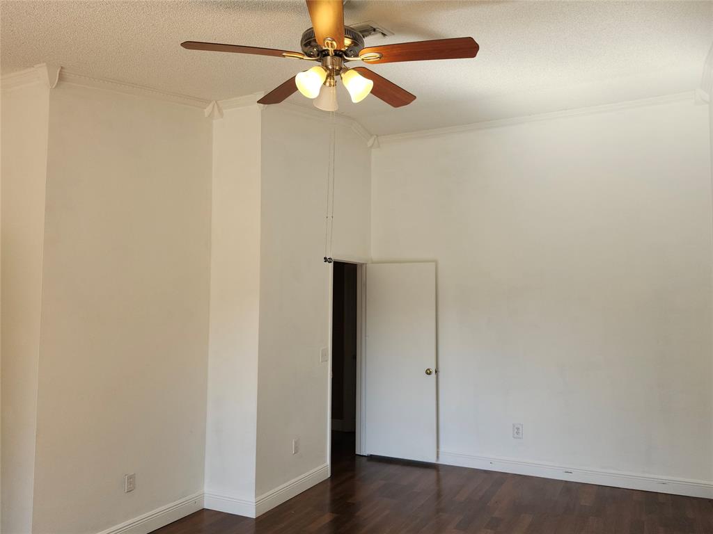 4192 Southwest 87th Terrace Davie, FL 33328 - Photo 20 of 35 an empty room with a fan and a fan
