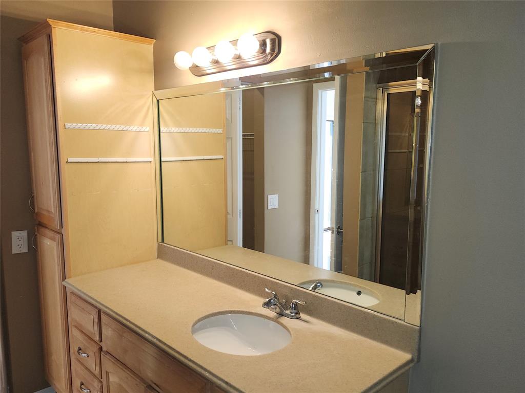 4192 Southwest 87th Terrace Davie, FL 33328 - Photo 21 of 35 a bathroom with a sink vanity and a mirror