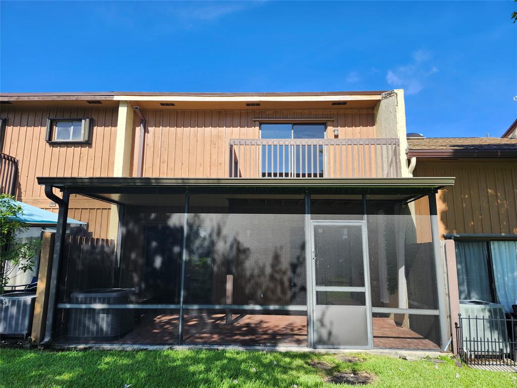 4192 Southwest 87th Terrace Davie, FL 33328 - Photo 3 of 35 a backyard of a house with table and chairs