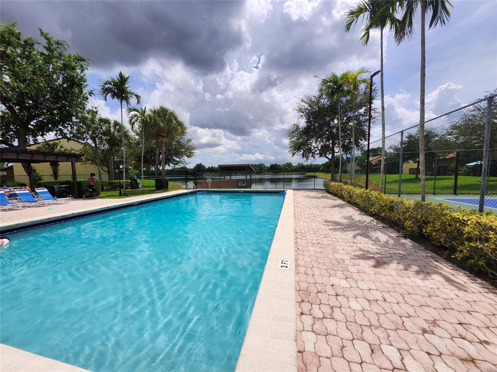 4192 Southwest 87th Terrace Davie, FL 33328 - Photo 31 of 35 a view of swimming pool is middle in the garden