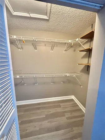 a view of a room with racks on the wall