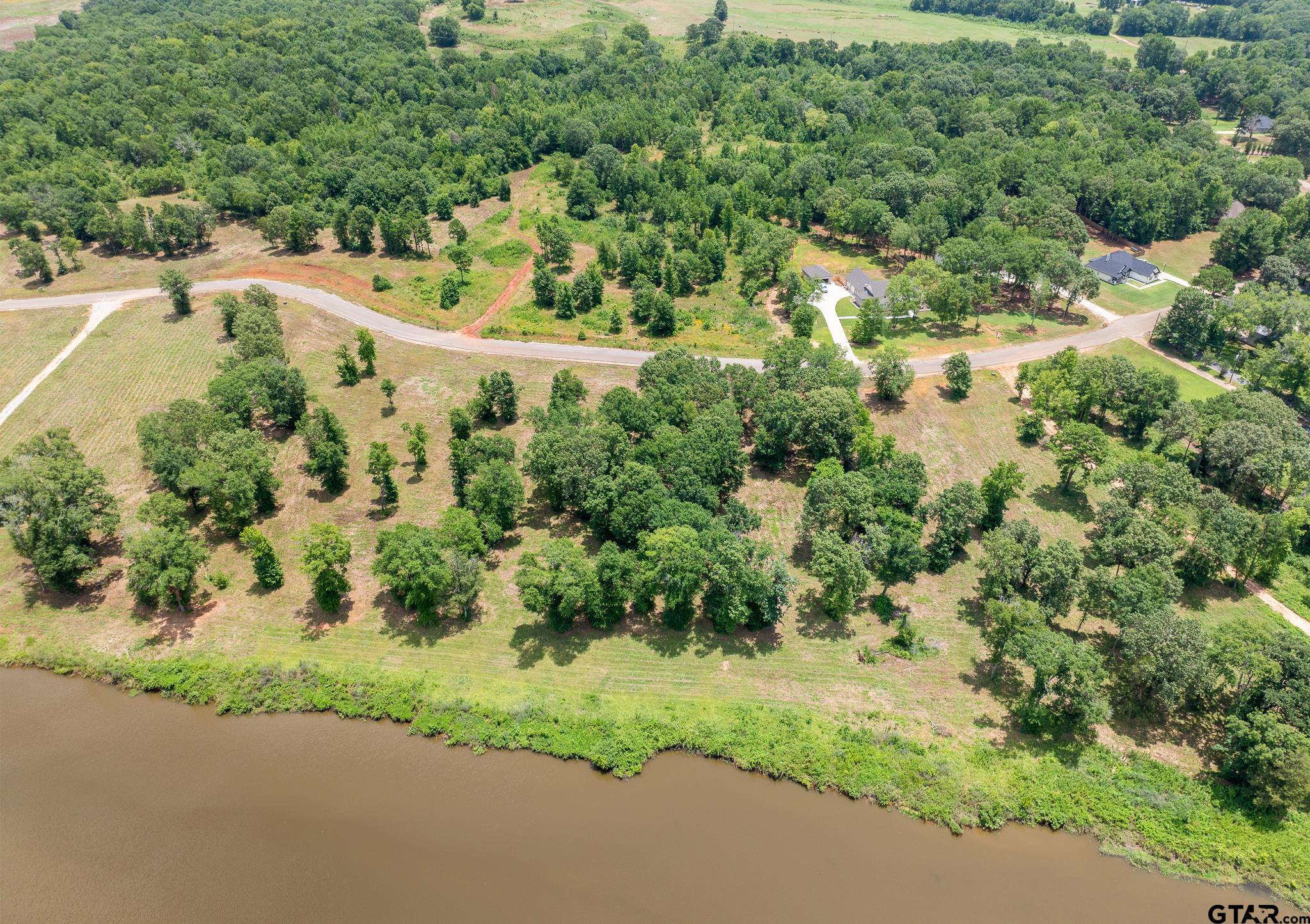 805 Stone Chimney Road Bullard, TX 75757 - Photo 3 of 7 an aerial view of residential house with outdoor space and trees all around