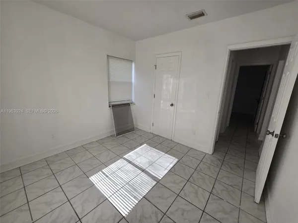 an empty room with a window