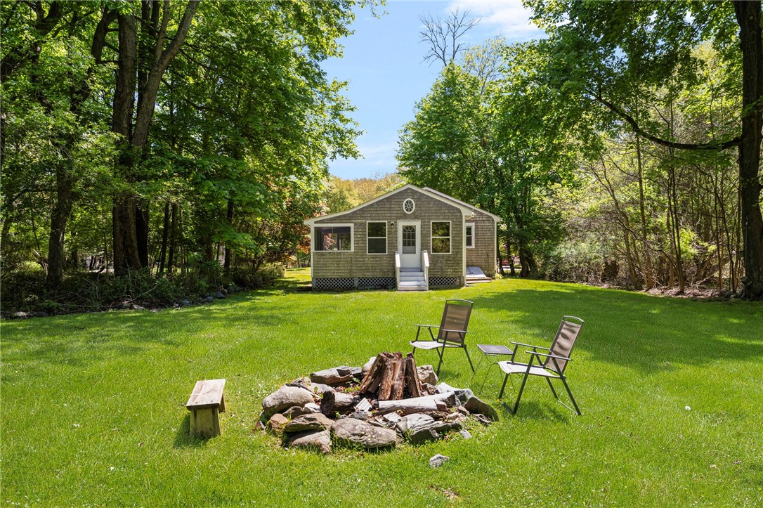 10 Summer Street Jamestown, RI 02835 - Photo 21 of 23 Enjoy a nice evening by the fire pit