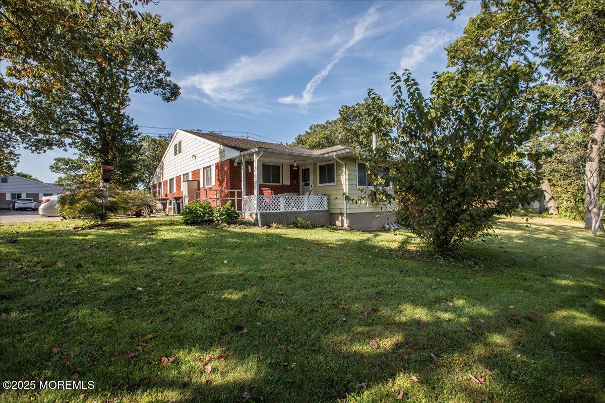 9 D Cardinal Street Manchester Township, NJ 08759 - Photo 22 of 30 a front view of house with yard and green space