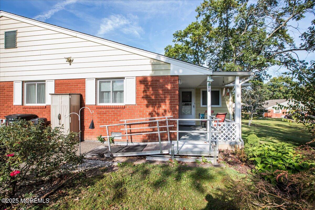 9 D Cardinal Street Manchester Township, NJ 08759 - Photo 26 of 30 a front view of a house with garden