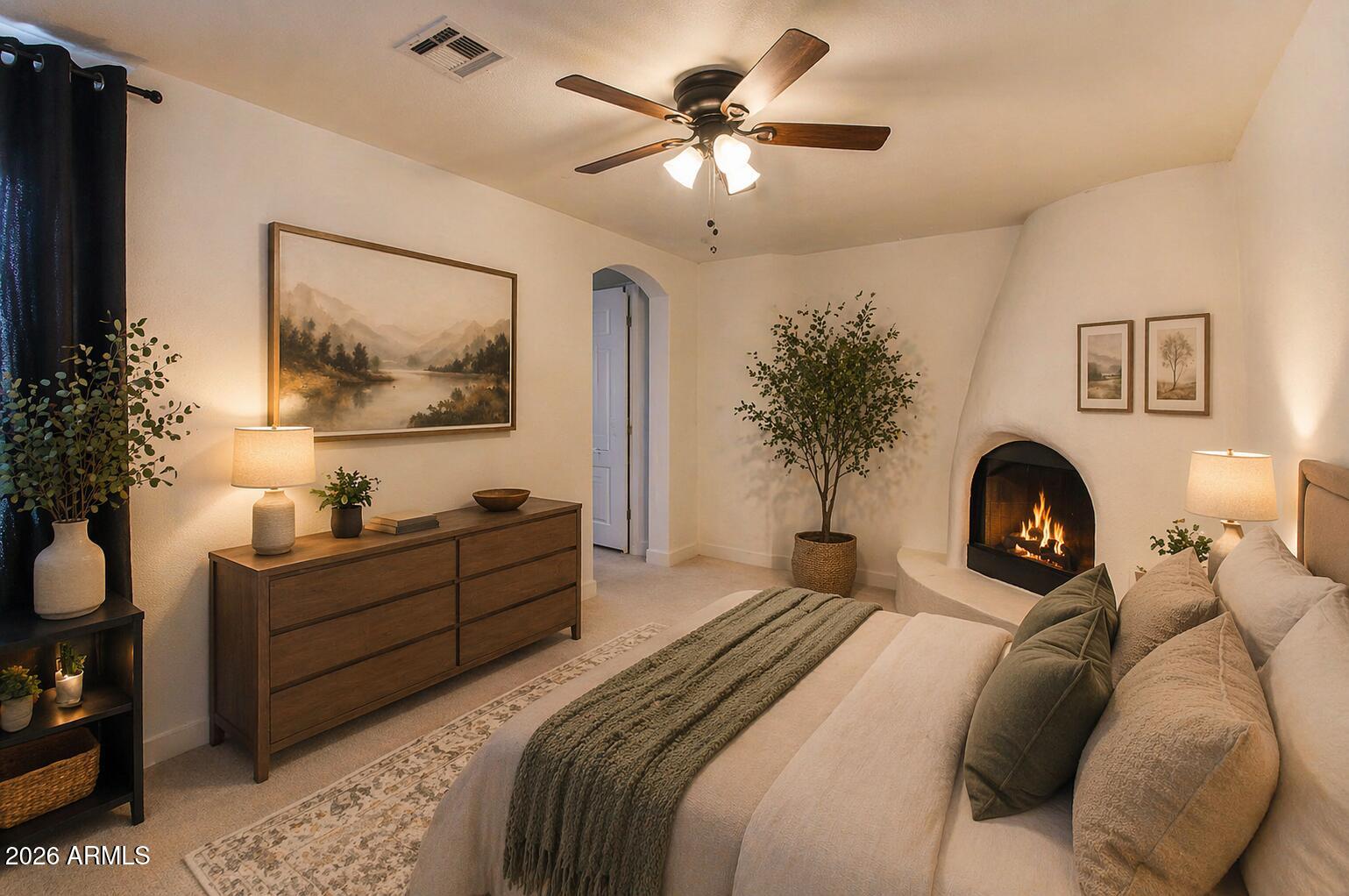 310 North Mountain View Road Apache Junction, AZ 85119 - Photo 11 of 14 a bedroom with a bed and a chandelier