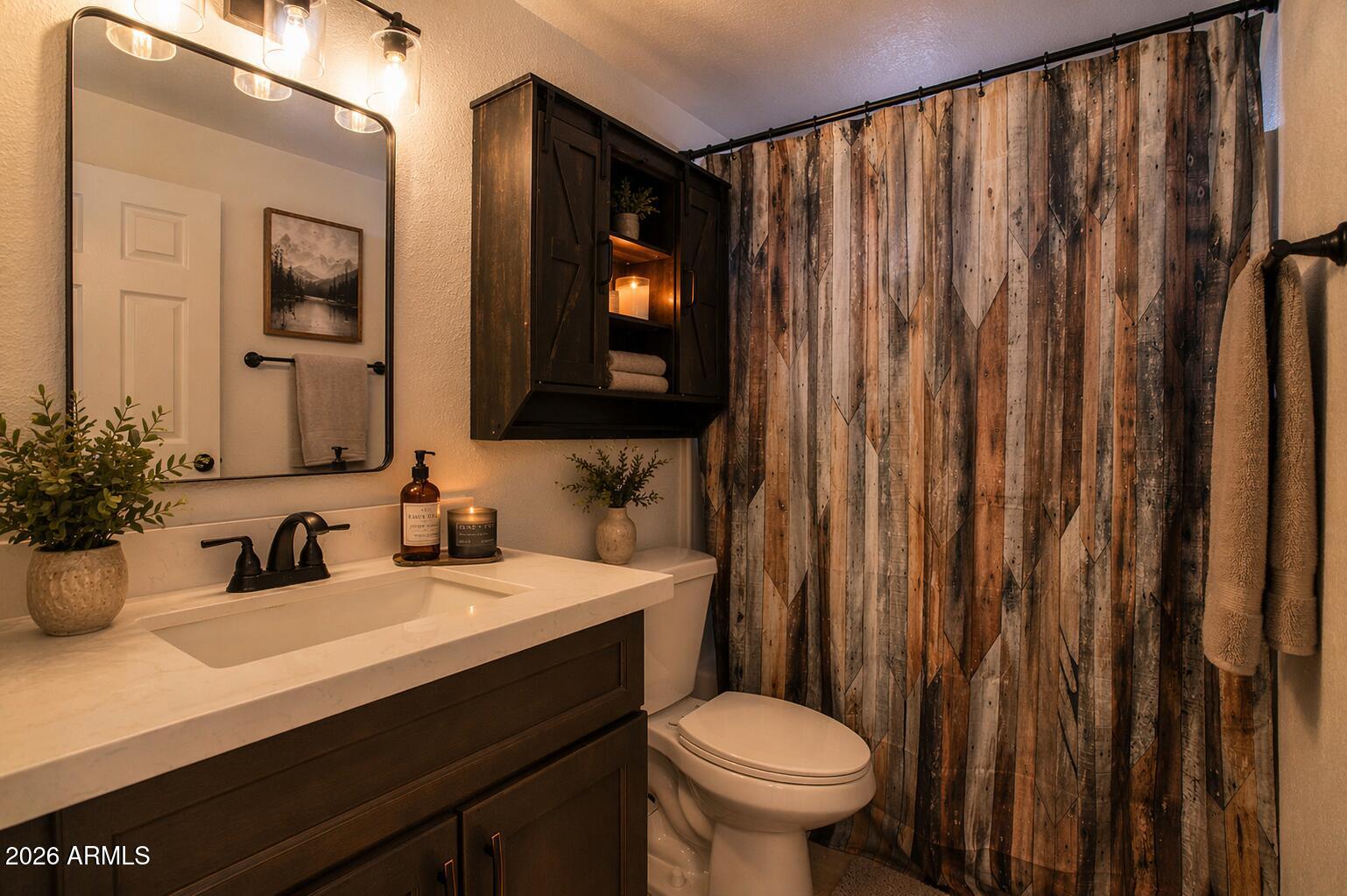 310 North Mountain View Road Apache Junction, AZ 85119 - Photo 10 of 14 a bathroom with a sink and a mirror