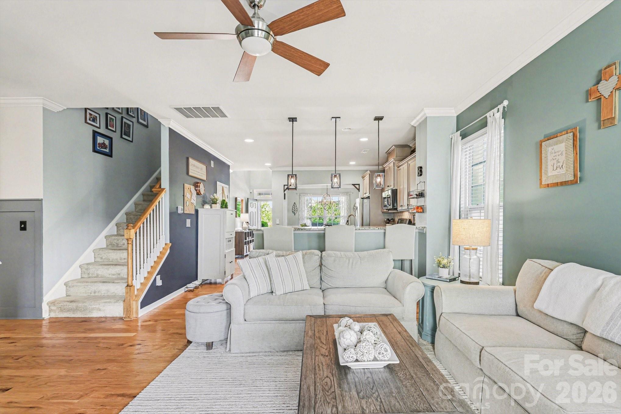 5153 Waterloo Drive Tega Cay, SC 29708 - Photo 11 of 29 a living room with furniture and a wooden floor