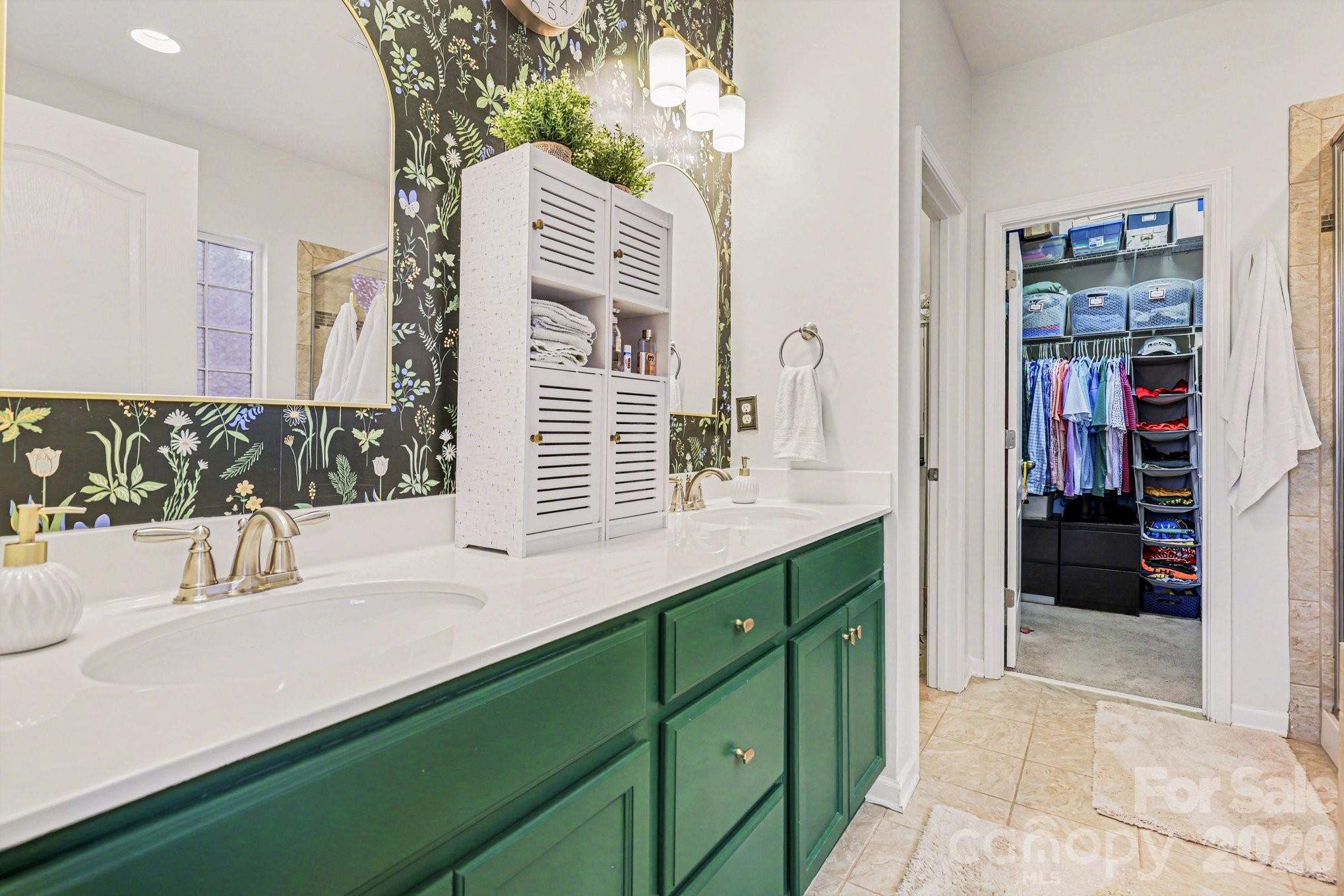 5153 Waterloo Drive Tega Cay, SC 29708 - Photo 14 of 29 a bathroom with a sink and a mirror