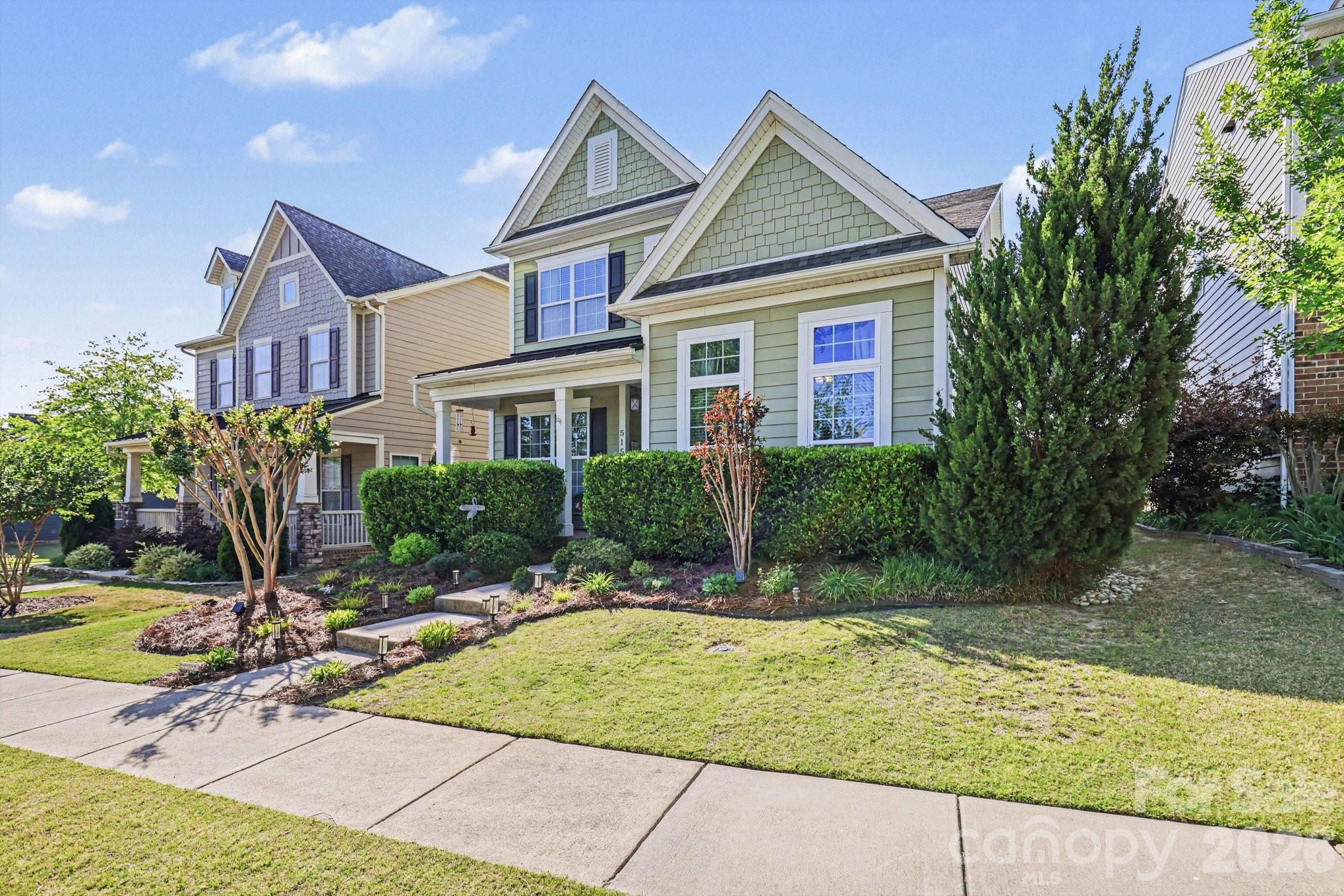 5153 Waterloo Drive Tega Cay, SC 29708 - Photo 2 of 29 a view of a house with entertaining space