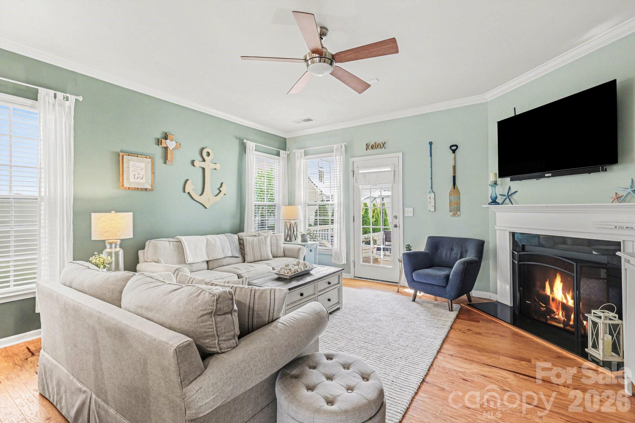 5153 Waterloo Drive Tega Cay, SC 29708 - Photo 10 of 29 a living room with furniture fireplace and flat screen tv