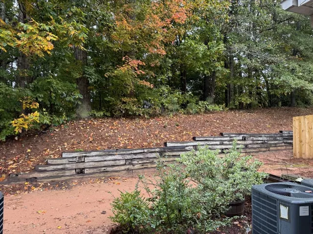 a backyard of a house with lots of green space