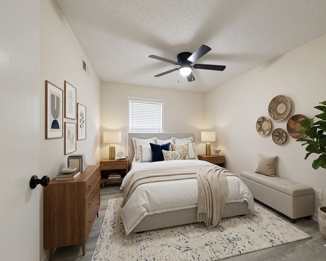 368 Tara Ridge Cove Collierville, TN 38017 - Photo 15 of 25 a bedroom with a bed couches and a window