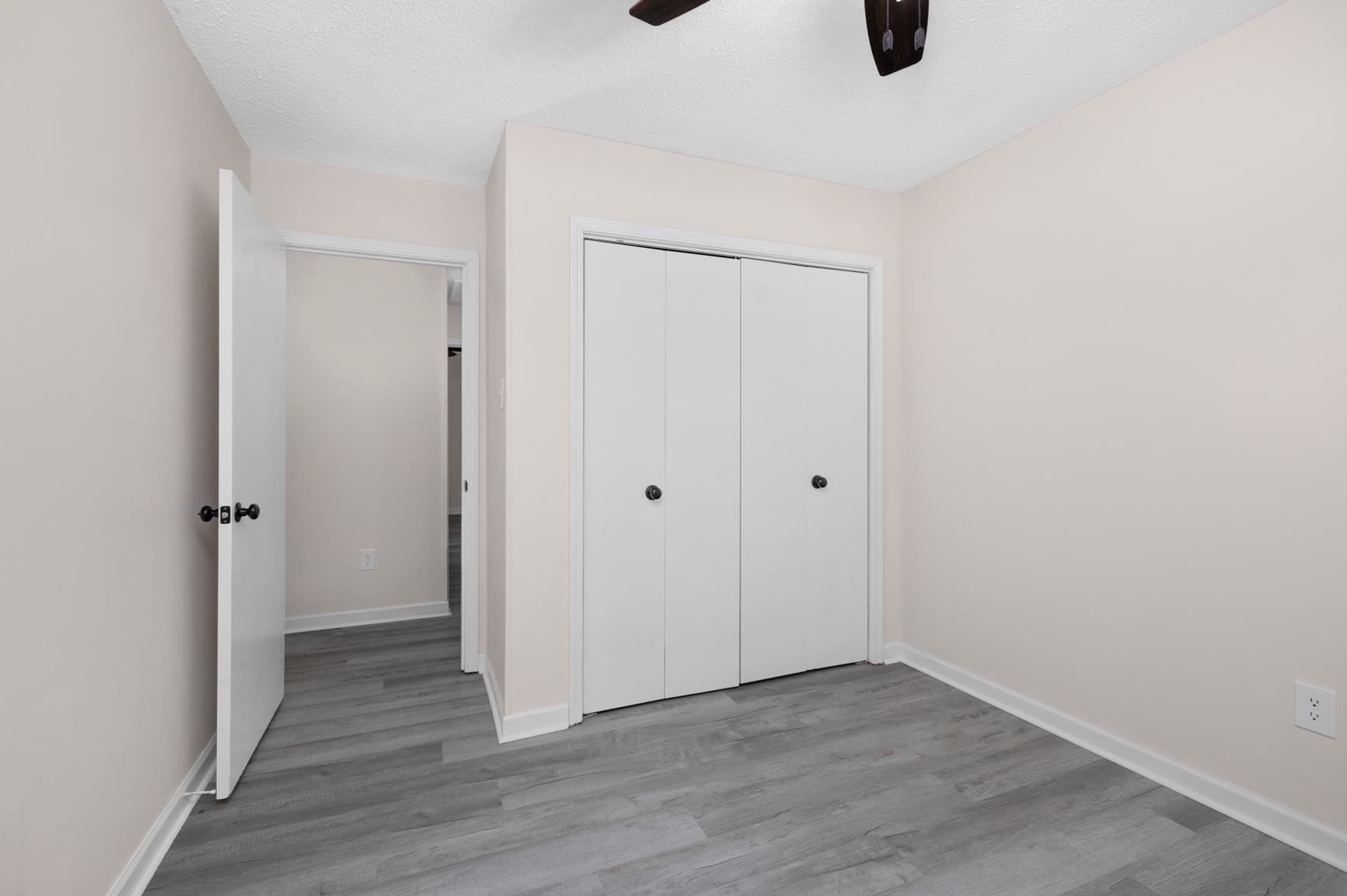 368 Tara Ridge Cove Collierville, TN 38017 - Photo 20 of 25 a view of an empty room with wooden floor
