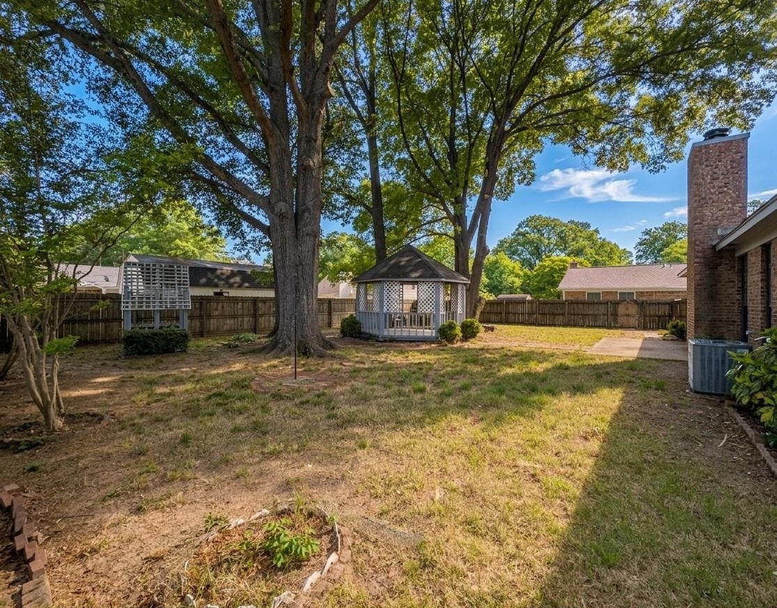 368 Tara Ridge Cove Collierville, TN 38017 - Photo 21 of 25 a view of a house with backyard and a tree