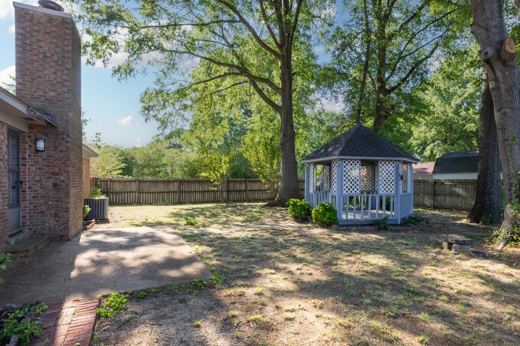 368 Tara Ridge Cove Collierville, TN 38017 - Photo 22 of 25 a view of a house with backyard and sitting area