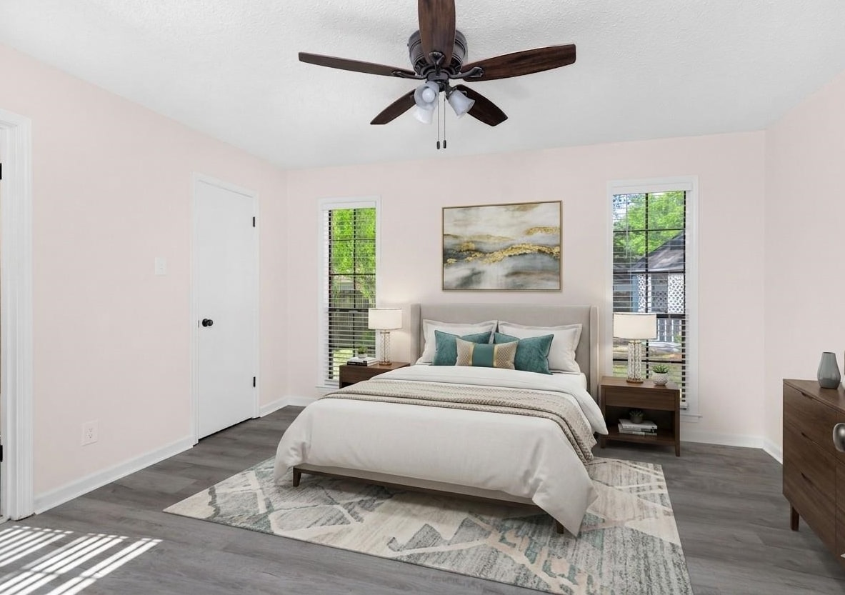 368 Tara Ridge Cove Collierville, TN 38017 - Photo 9 of 25 a bedroom with a bed and wooden floor